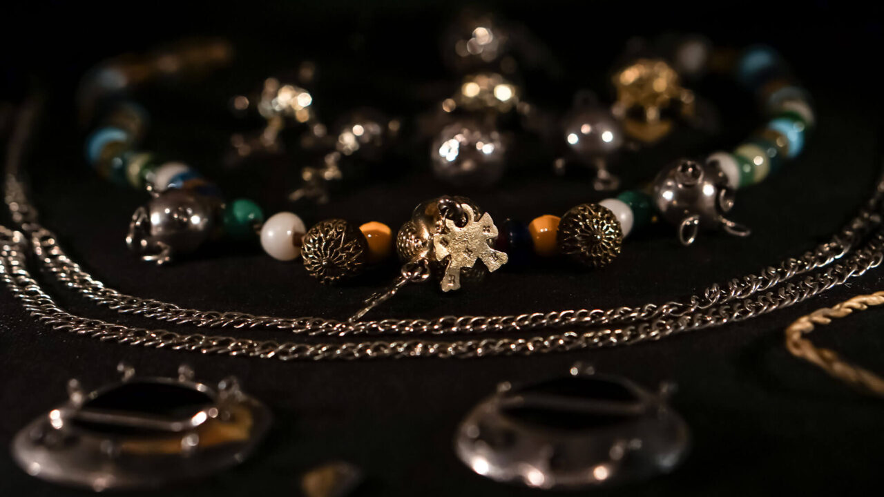 From the Silvermuseet's silver exhibition: jewelry and colored glass beads.